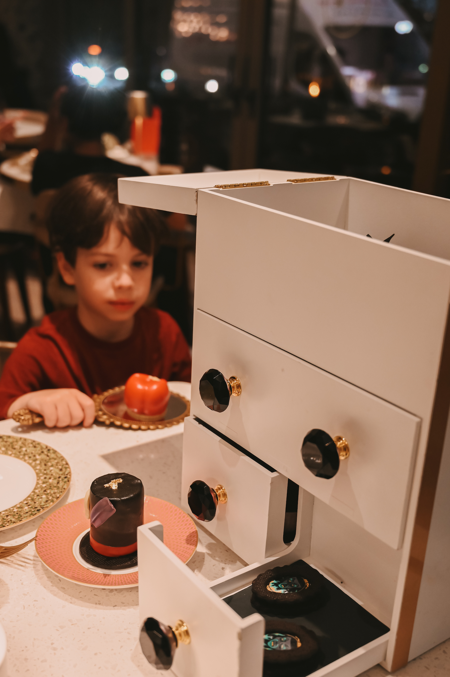 Small Child at One upon a Villain afternoon tea at Hilton Park lane on for October Half Term 