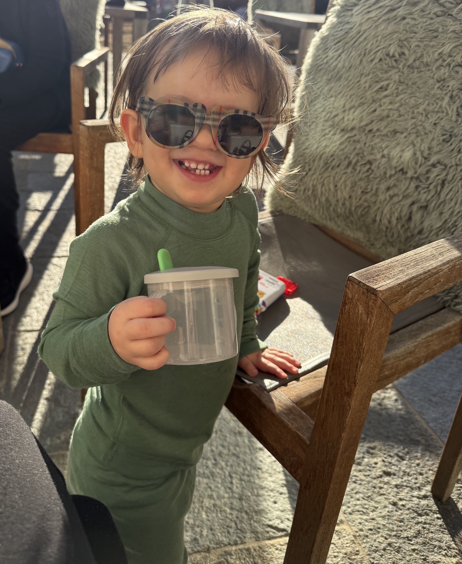 Toddler wearing sun glasses